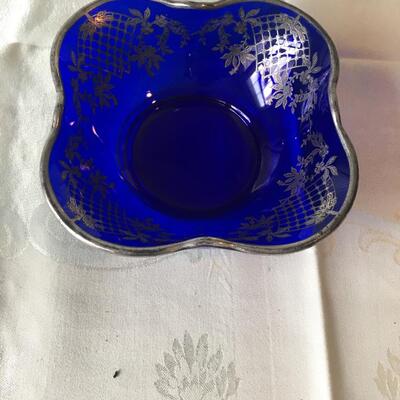 Silver overlay on cobalt blue bowl