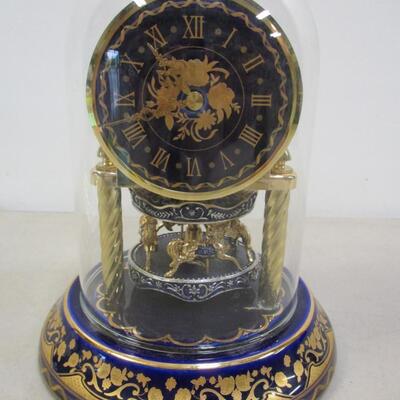 German Cobalt Anniversary Porcelain Clock Embossed Gold Carousel