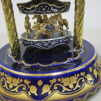 German Cobalt Anniversary Porcelain Clock Embossed Gold Carousel