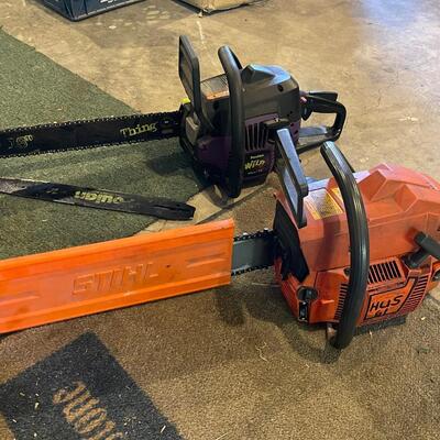 SH97 Two chainsaws, one is a Husqvarna, the other is a Poulan wild thing.