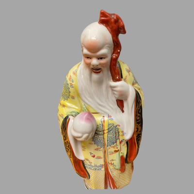 Two Ceramic Asian Figurines.