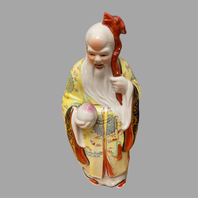 Two Ceramic Asian Figurines.