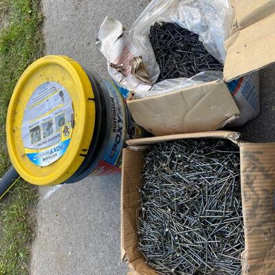 SH77 Box of nails, a box of screws, and tub of partially used Epoxy