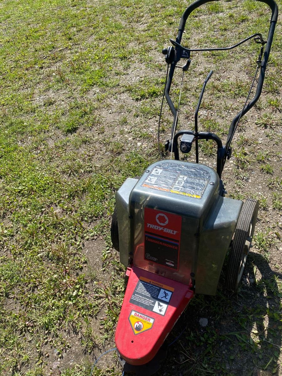 SH18 Troy Bilt 6HP trimmer mower EstateSales
