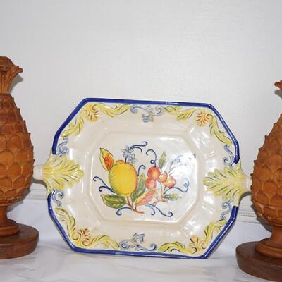 DECORATIVE GROUPING - PAIR OF WOODEN CARVED FINIALS./HANDLED CERAMIC PLATE OF FRUIT PATTERN HAND PAINTED /GLAZED