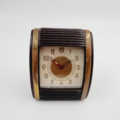 VINTAGE MC WESTCLOX BROWN ROLL TOP TRAVEL ALARM CLOCK