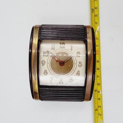 VINTAGE MC WESTCLOX BROWN ROLL TOP TRAVEL ALARM CLOCK