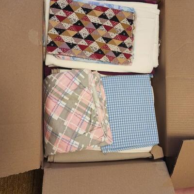 4 boxes of various fabric