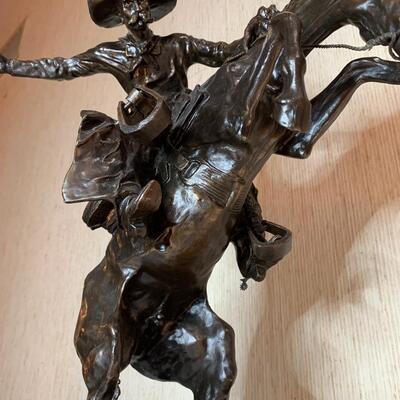 Metal Sculpture by Frederic Remington.