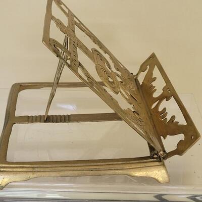 Lot 68: Antique Brass Book Stand and Brass Hand Clip