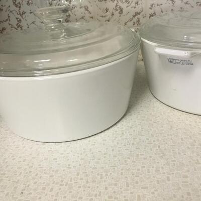 Vintage Corningware round casseroles with lids.