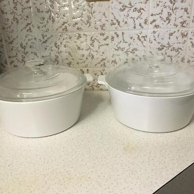 Vintage Corningware round casseroles with lids.
