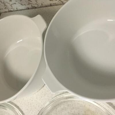 Vintage Corningware round casseroles with lids.