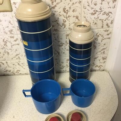 Vintage pair of 1971 Thermos Blue and Black filler