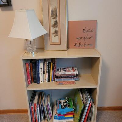 Bookshelf (books not included); lamp and art