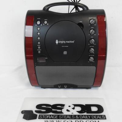 "Singing Machine" CD player with lights & speakers. Has inputs for microphones