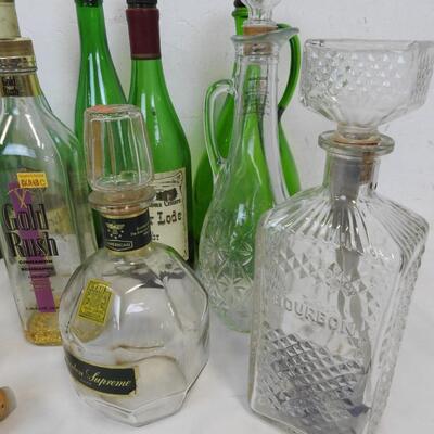 12 Liquor Bottles: 11 W/topper-1 Without, Various Shapes/Colors, 1 Extra Topper