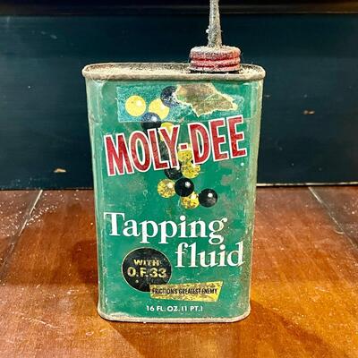 Molly Dee Tapping Fluid Can