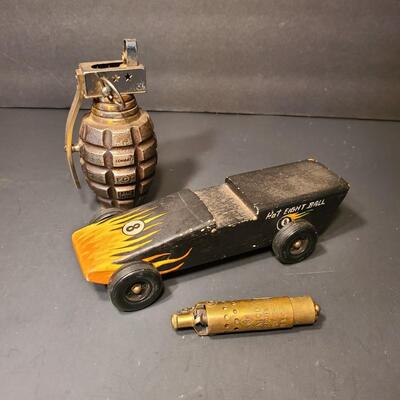 Lot 200: Grenade Lighter, Trench Lighter, and Pine Wood Derby Car