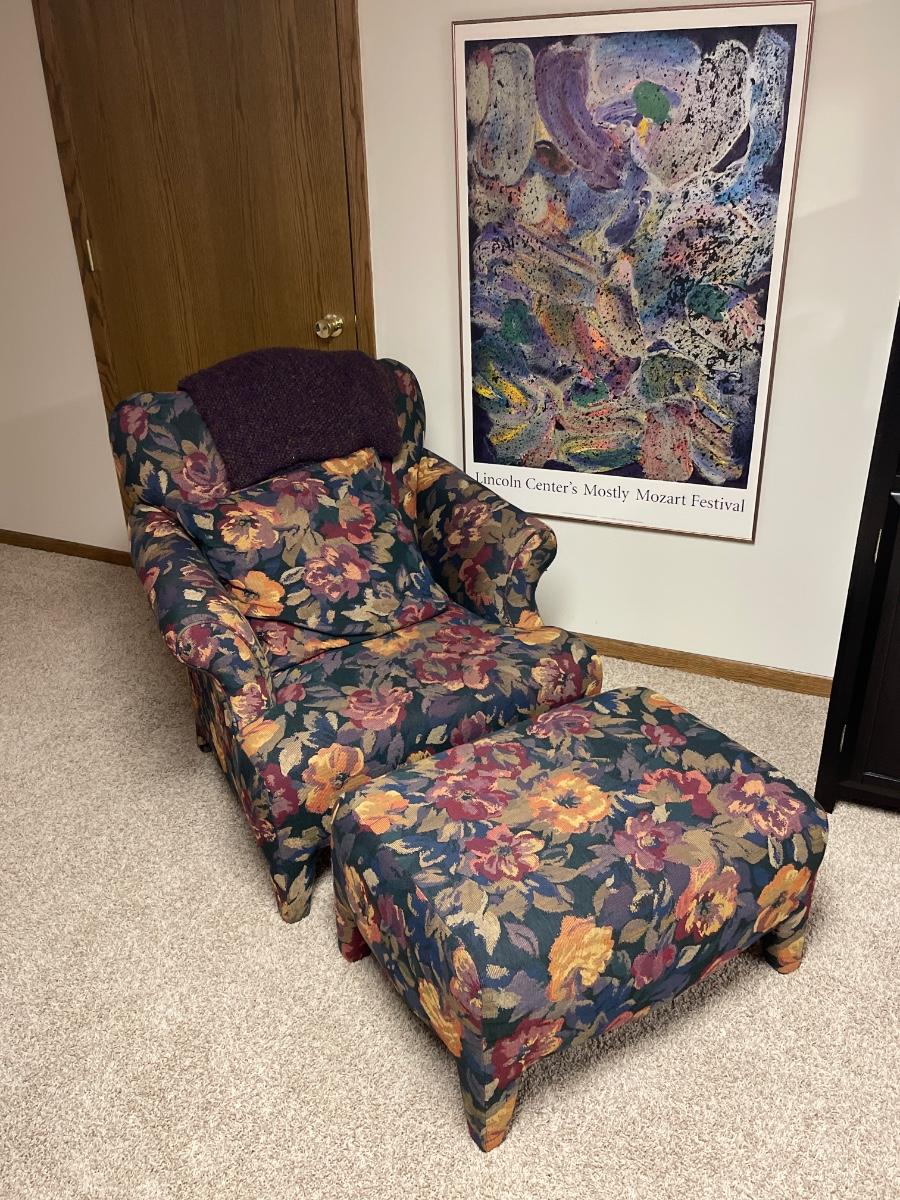 B16Floral arm chair with ottoman and artwork