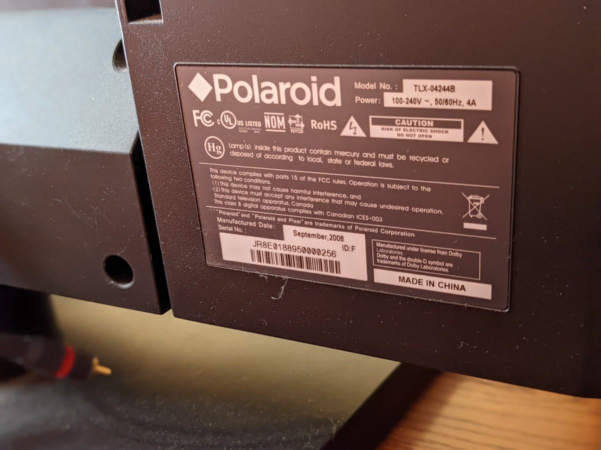 Quality Polaroid TV, Sony Sound Bar, and Entertainment Center