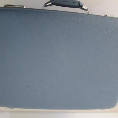 #44 American Tourister blue suitcase