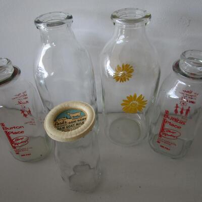 # 57 5 various size milk bottles
