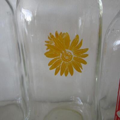 # 57 5 various size milk bottles