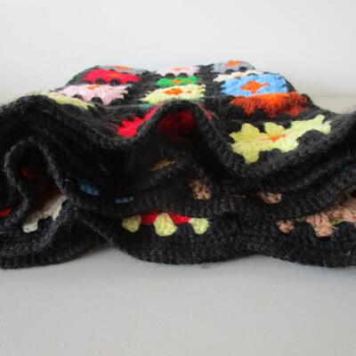 #61 Homemade Afghan and White Blanket with embroidered flowers at the top