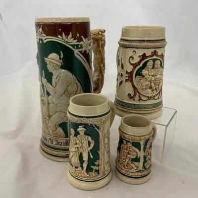 .186. Four German Steins | c. 1900