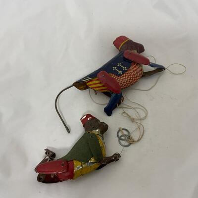 .234. Two Tin Climbing Monkeys