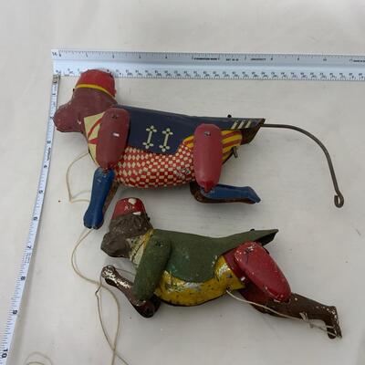 .234. Two Tin Climbing Monkeys