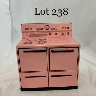 .238. Pink Wolverine Metal Stove | c. 1950