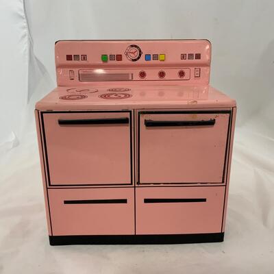 .238. Pink Wolverine Metal Stove | c. 1950