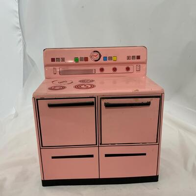 .238. Pink Wolverine Metal Stove | c. 1950