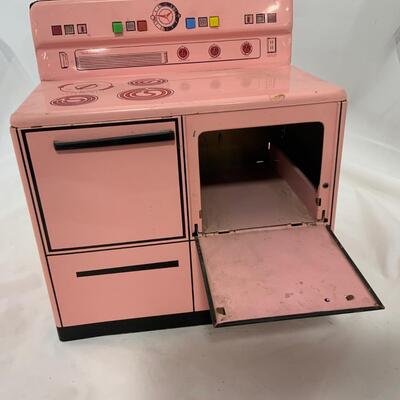 .238. Pink Wolverine Metal Stove | c. 1950