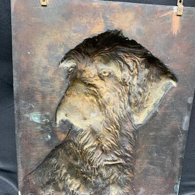 Copper casting of a dog