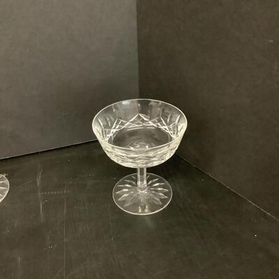 Lot 1055. Waterford Crystal Pedestal Champagne Glasses  ( 7 )
