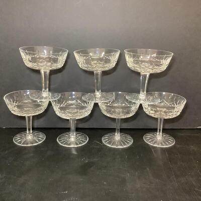 Lot 1055. Waterford Crystal Pedestal Champagne Glasses  ( 7 )