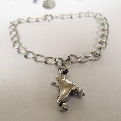 2 Sterling Silver Bracelets, US Coast Guard Great Lakes, and Roller Skate
