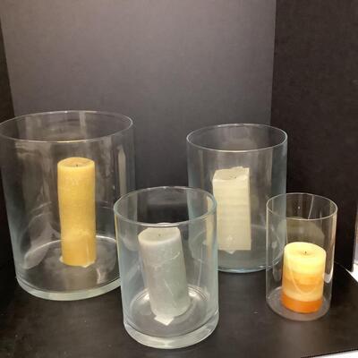 Lot 1097. Set of Four Clear Glass Hurricane Globes ( with candles )