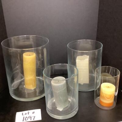 Lot 1097. Set of Four Clear Glass Hurricane Globes ( with candles )