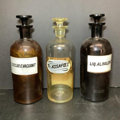 Lot 1131. Three Antique Apothecary Bottles