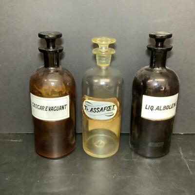 Lot 1131. Three Antique Apothecary Bottles