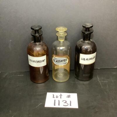 Lot 1131. Three Antique Apothecary Bottles