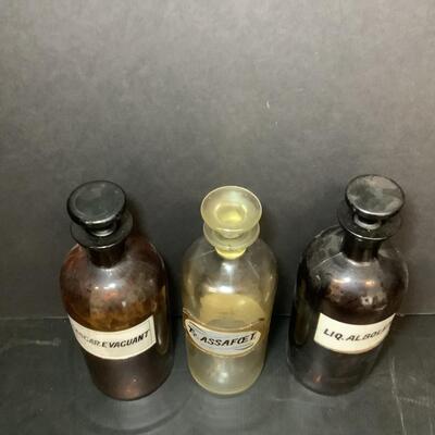 Lot 1131. Three Antique Apothecary Bottles