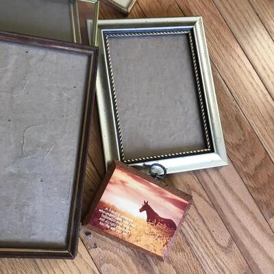 Box of smaller picture frames.