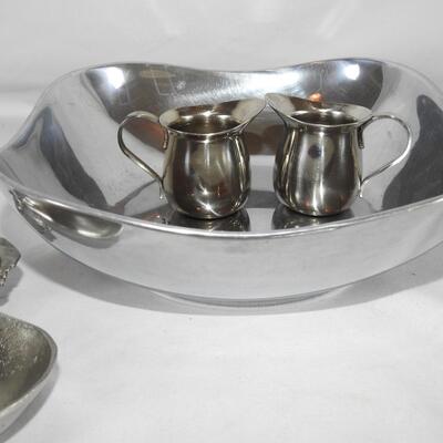 Pewter bowls with small cream pictures