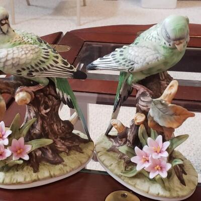 2 parakeet figures