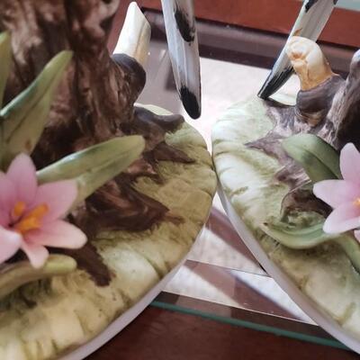 2 parakeet figures